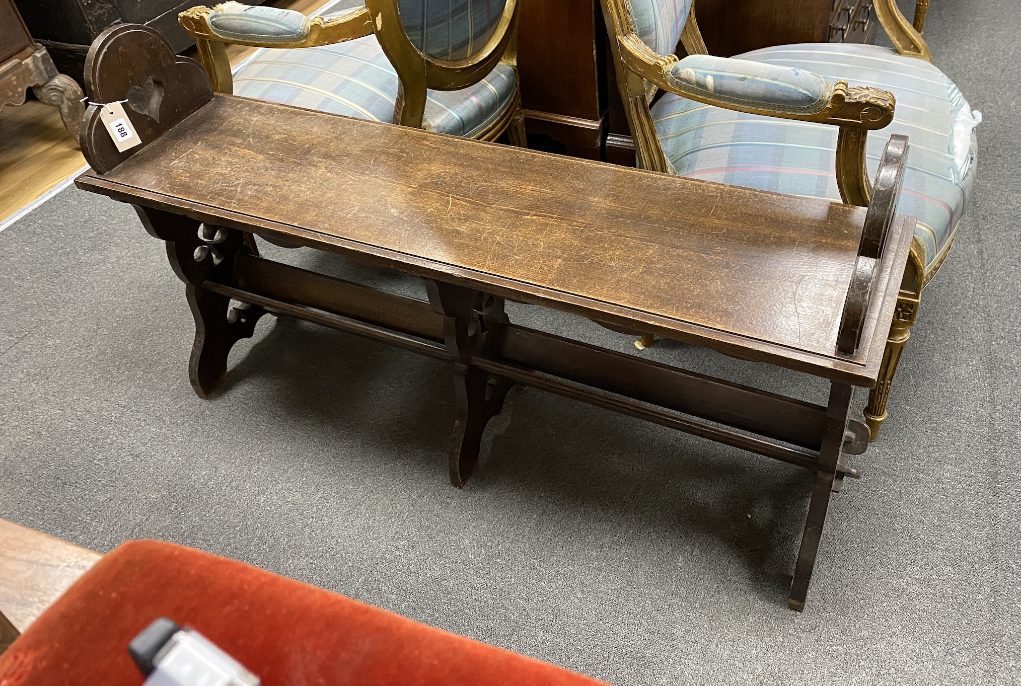 A late Victorian Gothic revival oak window seat, width 118cm, depth 30cm, height 69cm